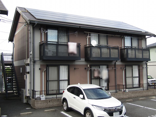 色あせたアパート外壁